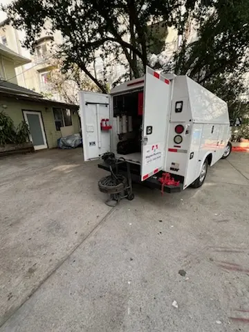 Magnet Plumbing service vehicle on-site for Grease Trap Cleaning in West Deerfield Beach